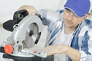 Carpenter making furniture