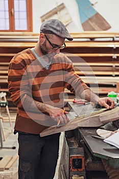 Carpenter man working in the workshop