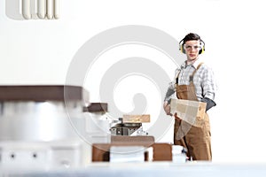 Carpenter man works with wooden planks in the joinery, with computer numerical control center, cnc machine,  isolated on a white