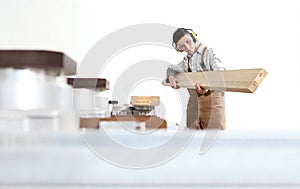 Carpenter man works with wooden planks in the joinery, with computer numerical control center, cnc machine,  isolated on a white