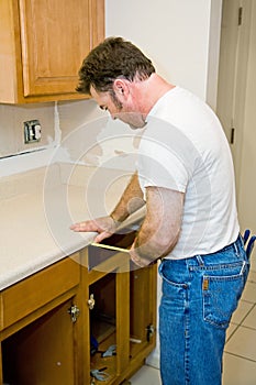 Carpenter Measuring Cabinets