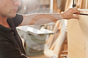 Carpenter placing a wooden flap