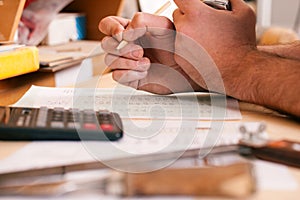 Carpenter planning his work