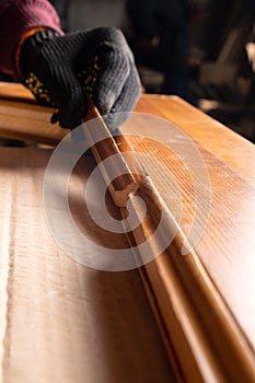 carpenter restoring old wooden doors,work in the workshop