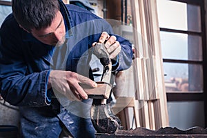 Carpenter restoring Wooden Furniture