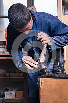 Carpenter restoring Wooden Furniture photo