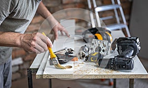 Carpenter`s work table with tools and fixtures