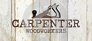 Carpenter text with planer on wooden background