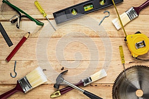 Carpenter tools on wood board