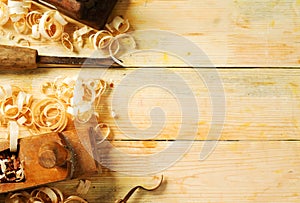 Carpenter tools on wood table background. Copy space. Top view