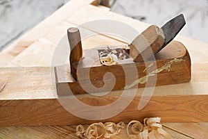 Carpenter tools on wood table background. Top view. Copy space