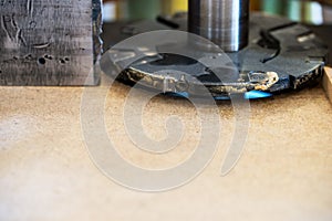 Carpenter tools on wooden table with sawdust