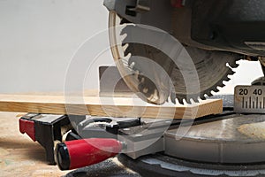 Carpenter tools on wooden table with sawdust. Circular Saw.