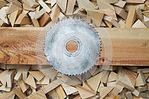 Carpenter tools on wooden table with sawdust. Circular Saw. Cutting a wooden plank