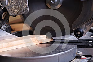 Carpenter tools on wooden table with sawdust. Circular Saw. Cutting a wooden plank