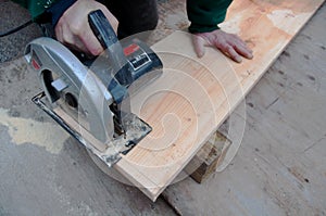 Carpenter Using Circular Saw