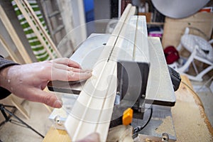 Carpenter using electric circular saw