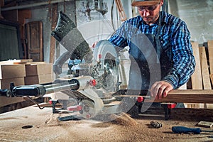 Carpenter work with circular saw