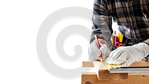 Carpenter at work on wooden boards. Carpentry