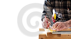 Carpenter at work on wooden boards. Carpentry