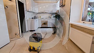 Carpenter worker installing substrate before wood parquet board during flooring work timelapse