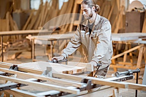 Carpenter working at the carpentry manufacturing