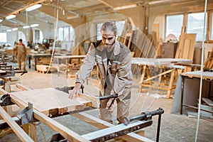 Carpenter working at the carpentry manufacturing