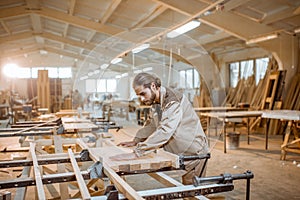 Carpenter working at the carpentry manufacturing