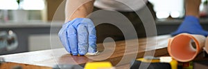 Carpenter working at carpentry workroom