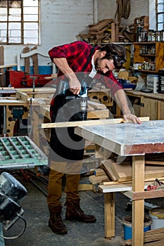 Carpenter working on his craft