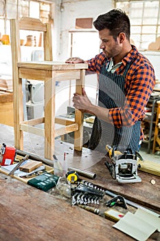 Carpenter working on his craft