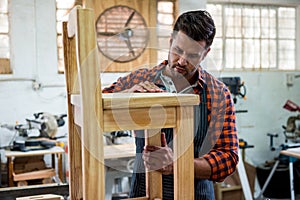 Carpenter working on his craft