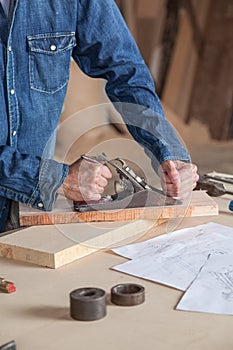 Carpenter working in his workshop