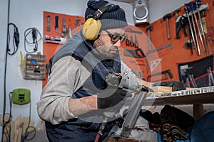 Carpenter working at his workstation.