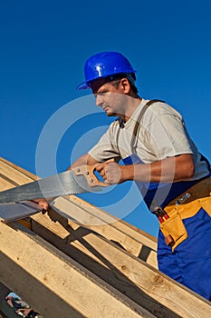 Carpenter working on the roof