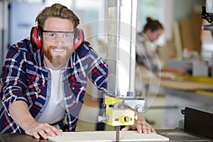 carpenter working very hard in workshop