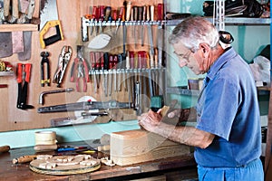 Carpenter working with wood