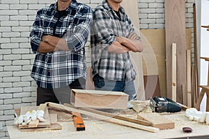 Carpenter working on wood craft at workshop