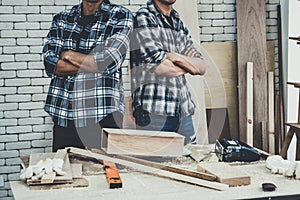 Carpenter working on wood craft at workshop