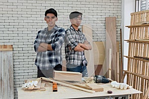 Carpenter working on wood craft at workshop