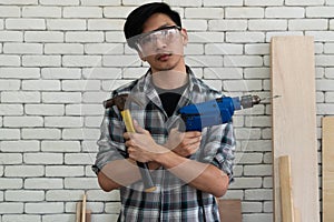 Carpenter working on wood craft at workshop