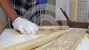 Carpenter working on wood craft at workshop