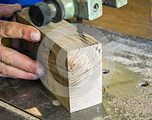 Carpenter workplace- Carpenter workplace. Man using saw to cut wood