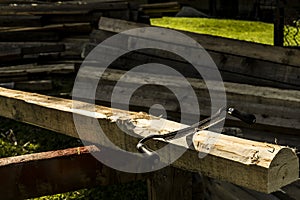 Carpenters scraper on a wooden pole