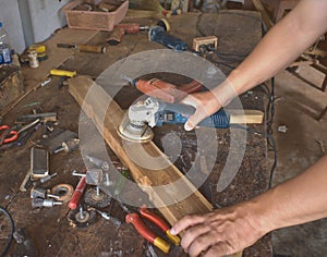 Carpenters, wood polishers, sanders, cutting boards and other equipment. Inside the old room of Asian craftsmen.Professional