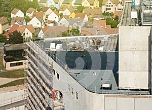 Carpenters working on a roof posing rubber anti-rain