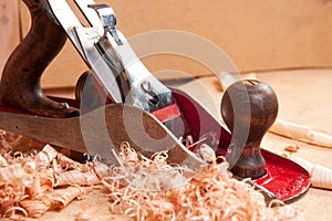 Carpentry plane and wood shavings photo