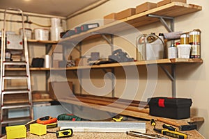 Carpentry, woodwork and equipment concept - work tools and workbench at workshop