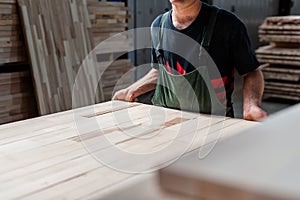 Carpentry worker in a manufacture production