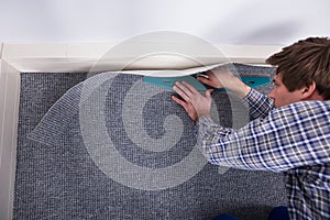 Carpet Fitter Installing Carpet
